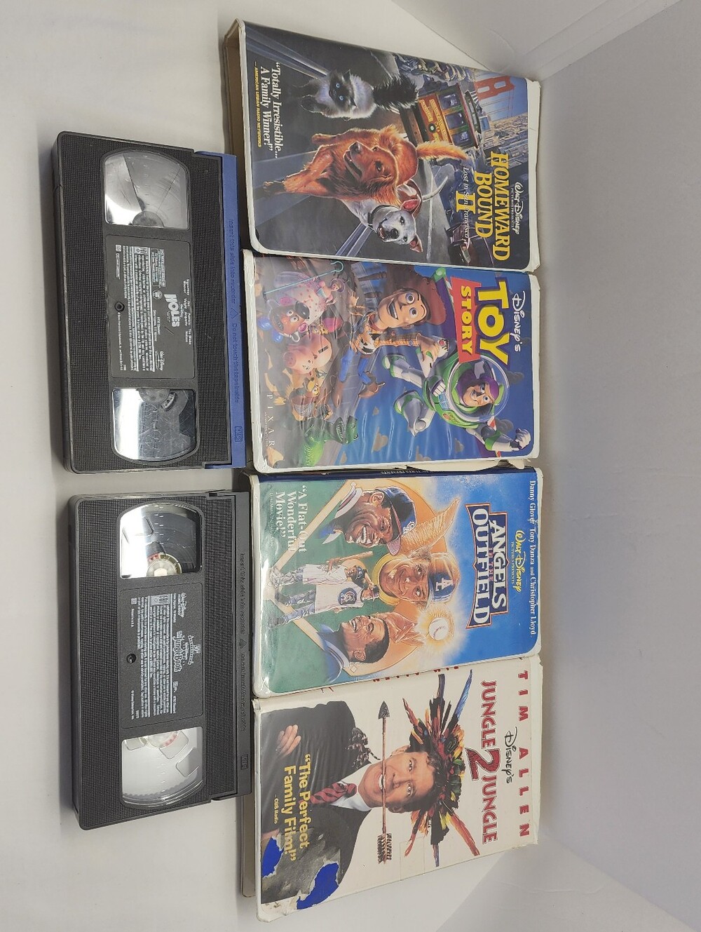 6 VHS tapes - Angels in the Outfield, Holes, Jungle 2 Jungle, Toy Story, Etc